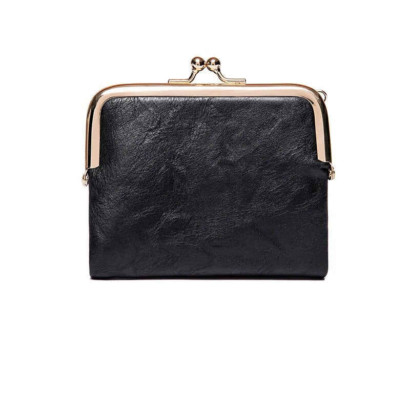 Schwarze Leder-Geldbörse mit Metallverschluss, elegantes Design, Damen-Accessoire.