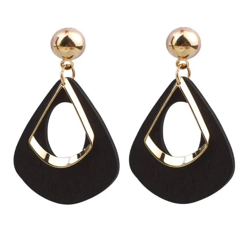 Schwarze und goldene Ohrringe, Tropfenform, modisch, Damen-Schmuck, elegantes Design.
