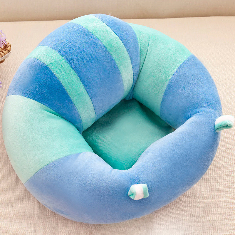 Blau-grünes, gestreiftes, rundes Katzenbett aus Plüsch für Haustiere, bequem und weich.