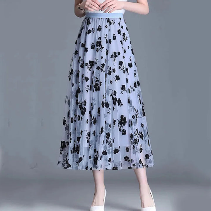 Damen-Mesh-Rock, blau mit schwarzen Blumen, eleganter Midi-Stil, modisch und vielseitig.