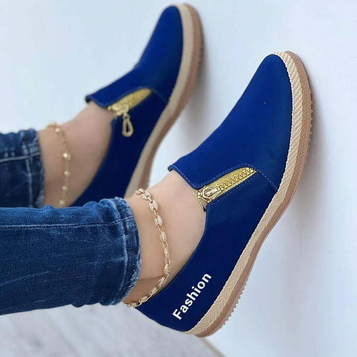 Blaue Damen-Sneaker mit Reißverschluss, modisch, bequem, Freizeitschuhe, goldene Details.