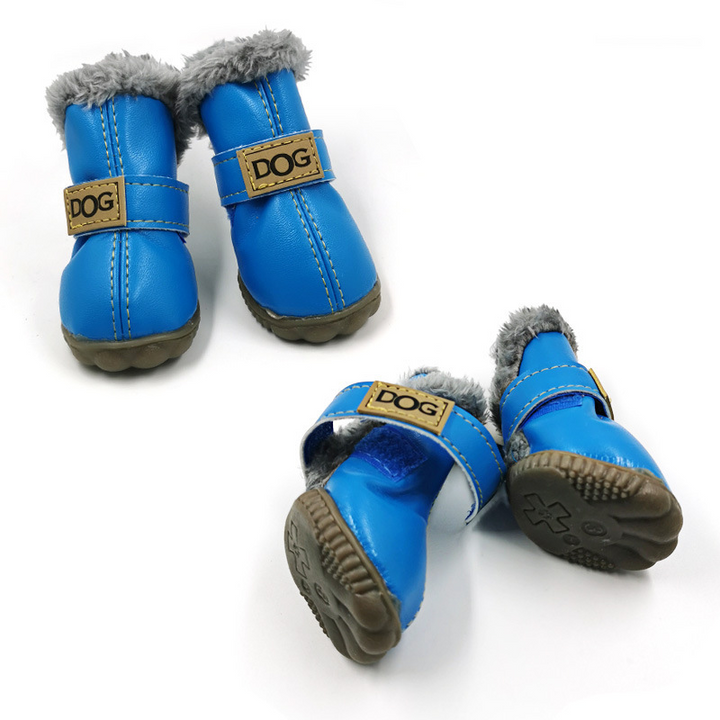 Blaue Hundeschuhe aus Leder mit Fellfutter, rutschfeste Sohle, Klettverschluss.