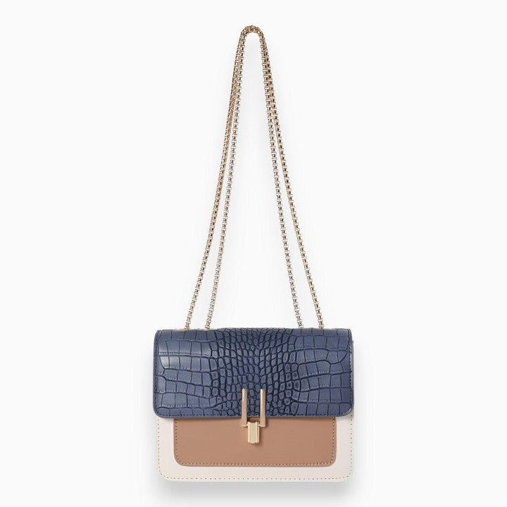 Blaue Krokodilleder-Handtasche mit Kettenriemen, beige und weiße Details, Damenmode.