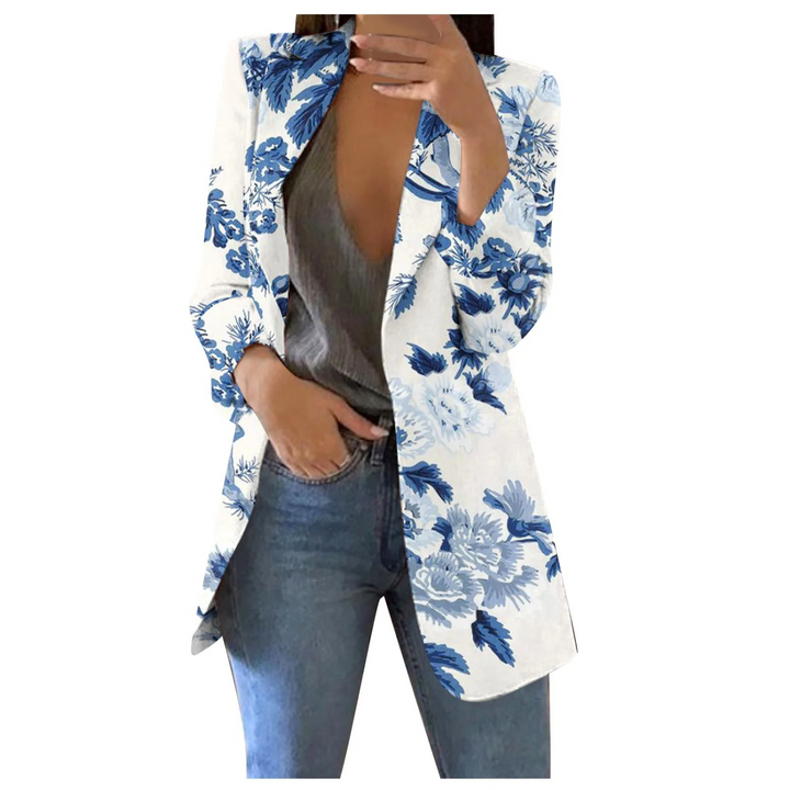 Damenblazer mit blauem Blumenmuster, weiß, tailliert, modisch, elegant, Freizeitkleidung.