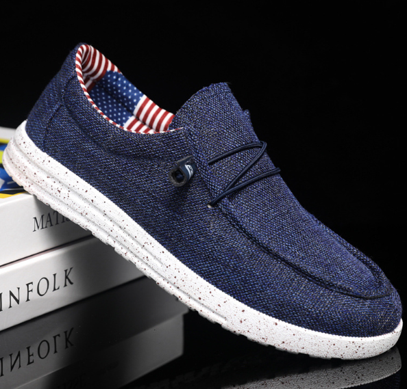 Blauer Herren-Sneaker aus Leinen mit weißer Sohle, lässiger Stil, ideal für Freizeitkleidung.