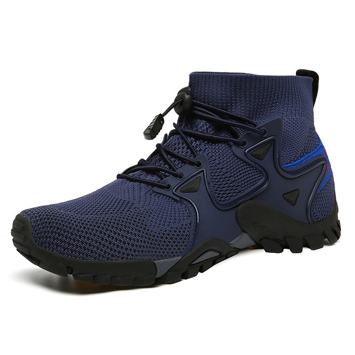 Dunkelblauer Wanderschuh, atmungsaktiv, rutschfeste Sohle, ideal für Outdoor-Aktivitäten.