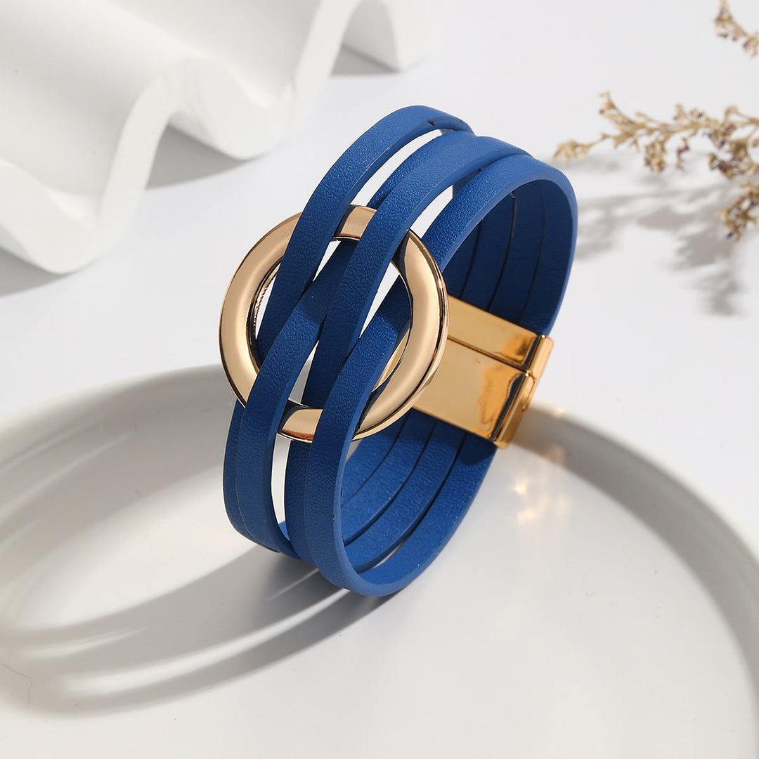 Blaues Lederarmband mit goldener Schnalle, modisches Accessoire, Damenarmband, elegant.