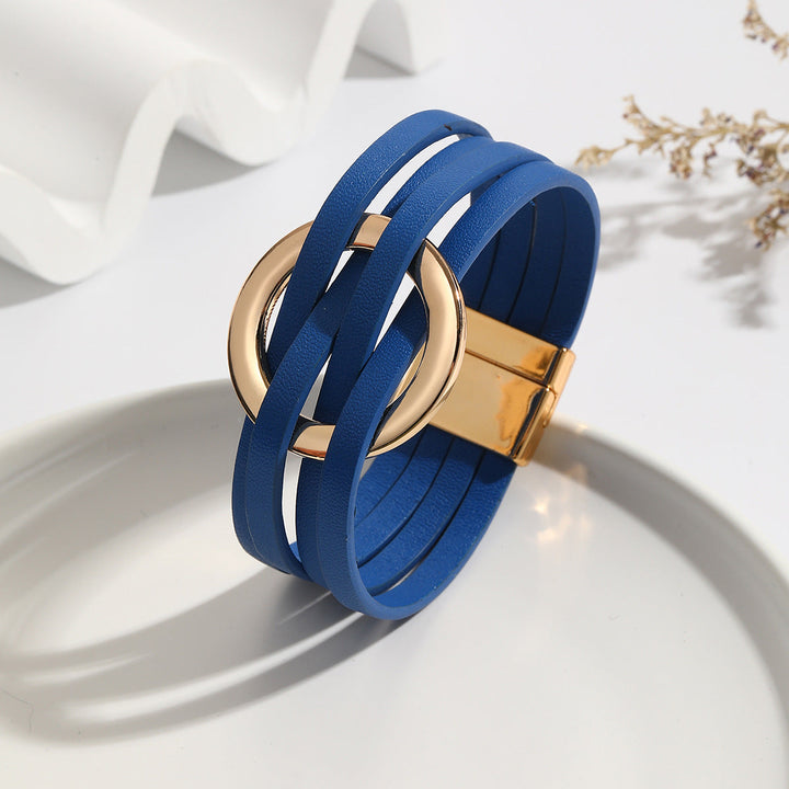 Blaues Lederarmband mit goldener Schnalle, modisches Accessoire, Damenarmband, elegant.