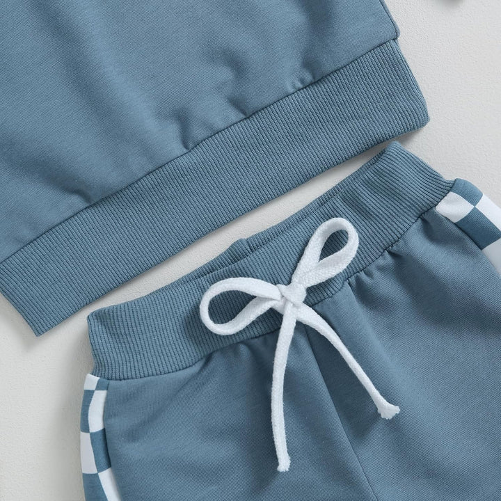 Blauer Kinder-Trainingsanzug mit Kordelzug, gestreifte Details, Baumwolle, bequem, modisch.