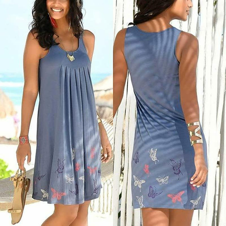 Blaues Sommerkleid mit Schmetterlingsmuster, ärmellos, knielang, ideal für Strandmode.