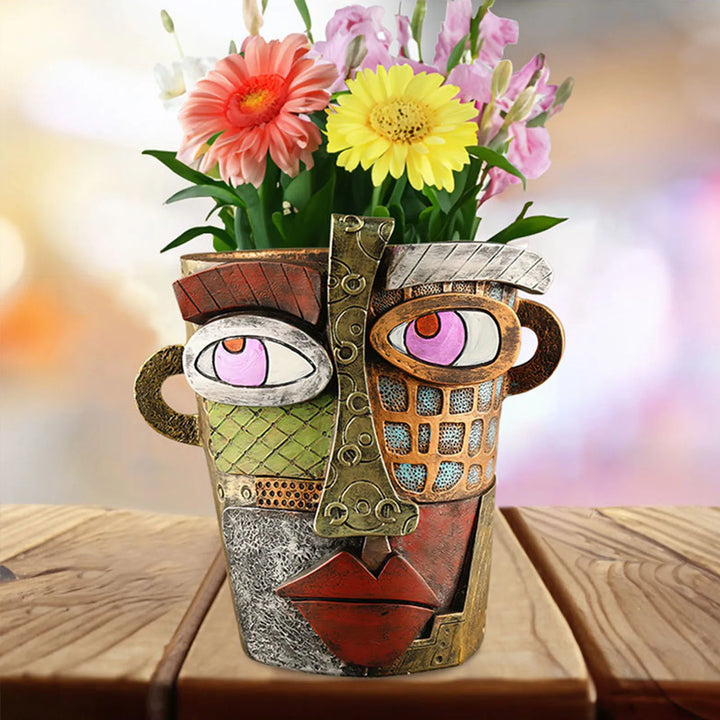 Abstrakter Blumentopf mit Gesichtsmotiv, bunt, aus Keramik, für Garten oder Geschenk.