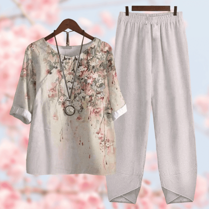 Damen Leinen Set, florales Oberteil, weiße Hose, lässig, bequem, Frühling, Mode, elegant.