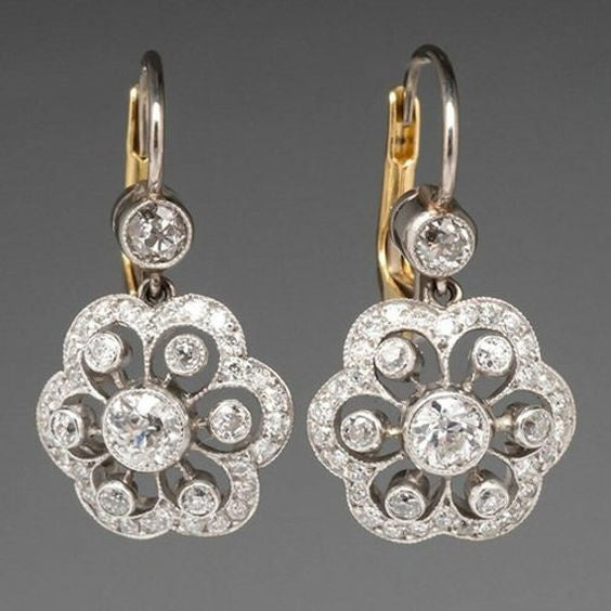 Goldene florale Ohrringe mit blauen Steinen, Schmuck für Frauen, Verlobung, Jubiläum.