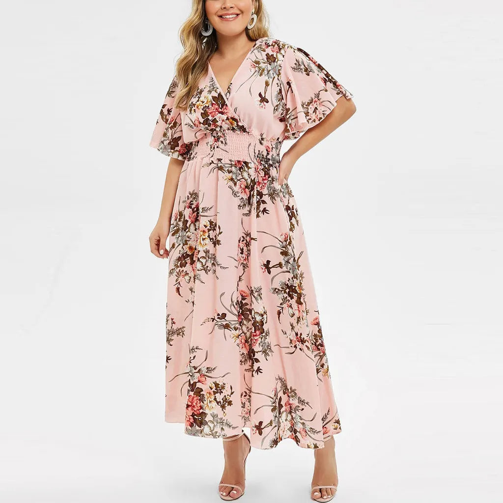 Frau in rosa Blumenkleid, V-Ausschnitt, Sommermode, elegantes Design, knöchellang.
