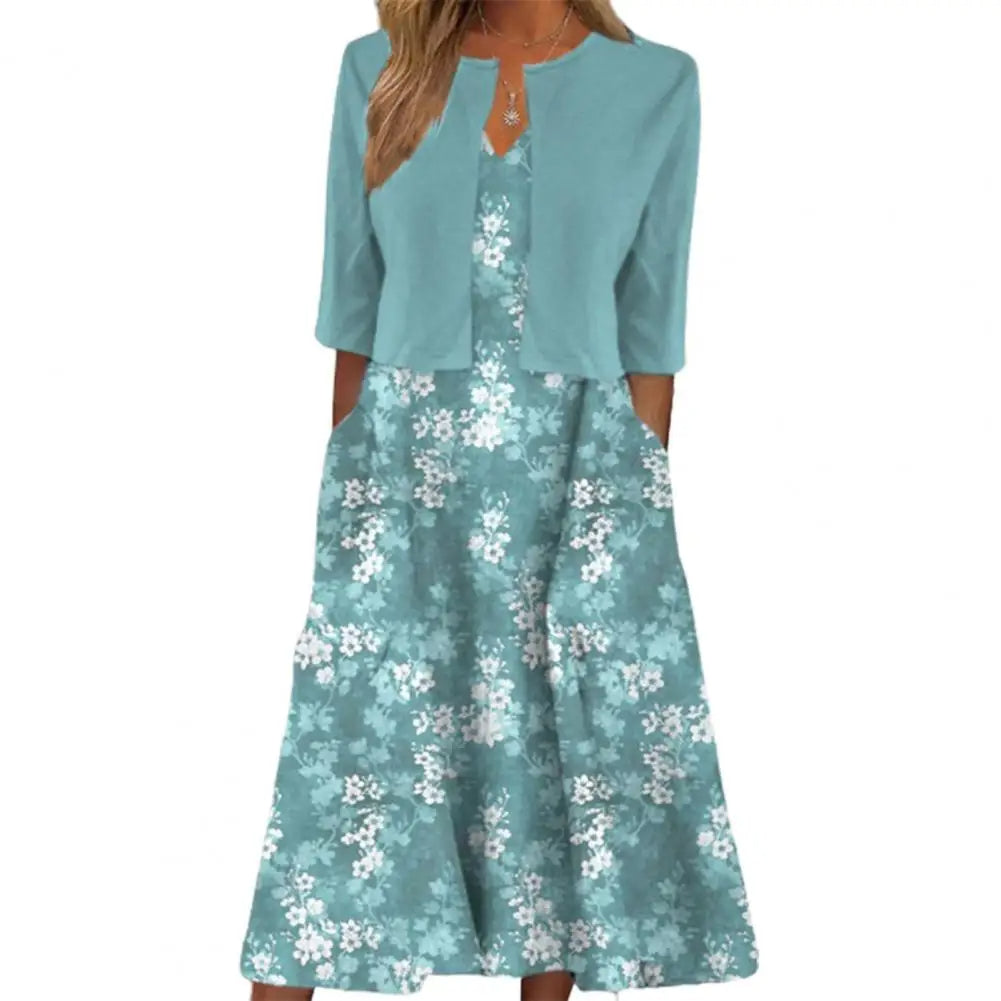 Damen Sommerkleid mit Blumenmuster, türkis, knielang, mit passender Jacke, elegant.