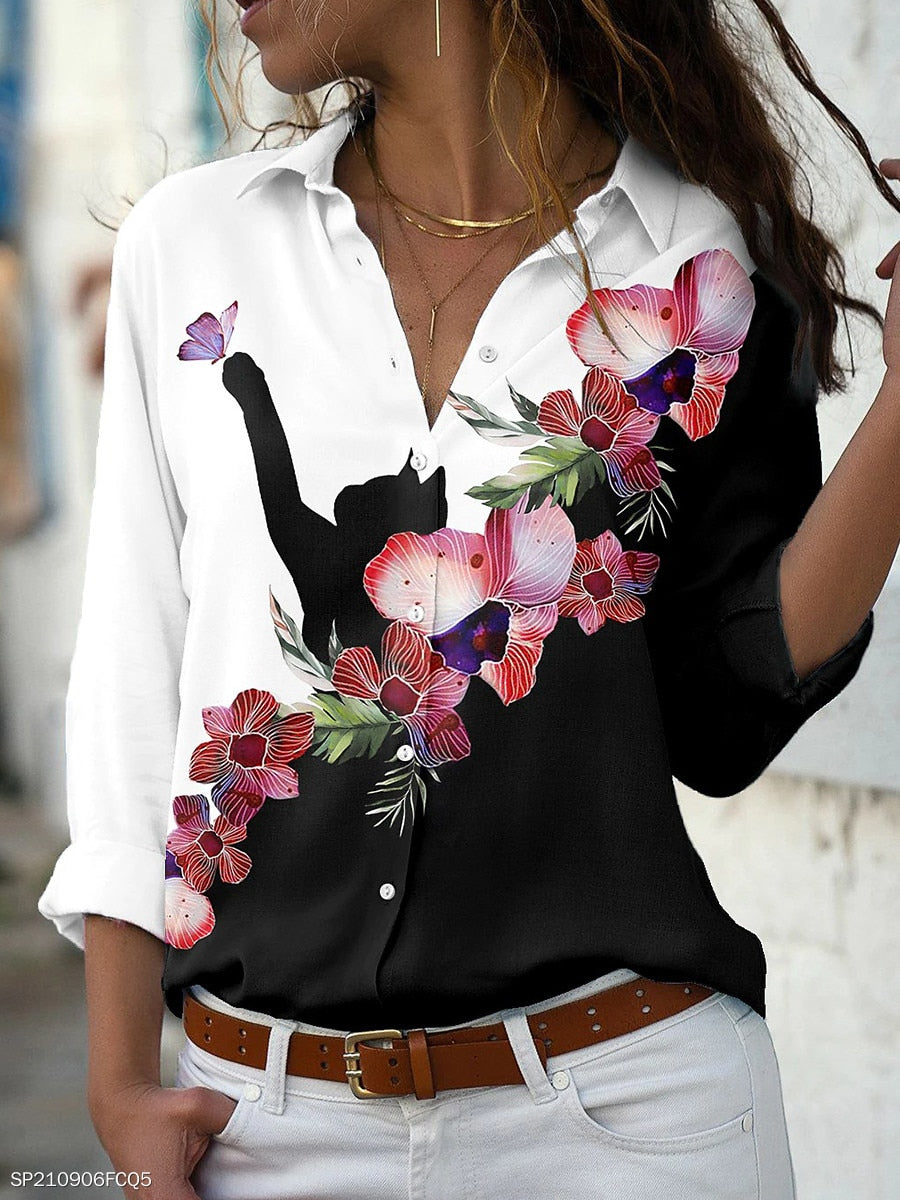 Damenbluse schwarz-weiß mit Blumenmuster, Langarm, Freizeitmode, Baumwolle, elegant.