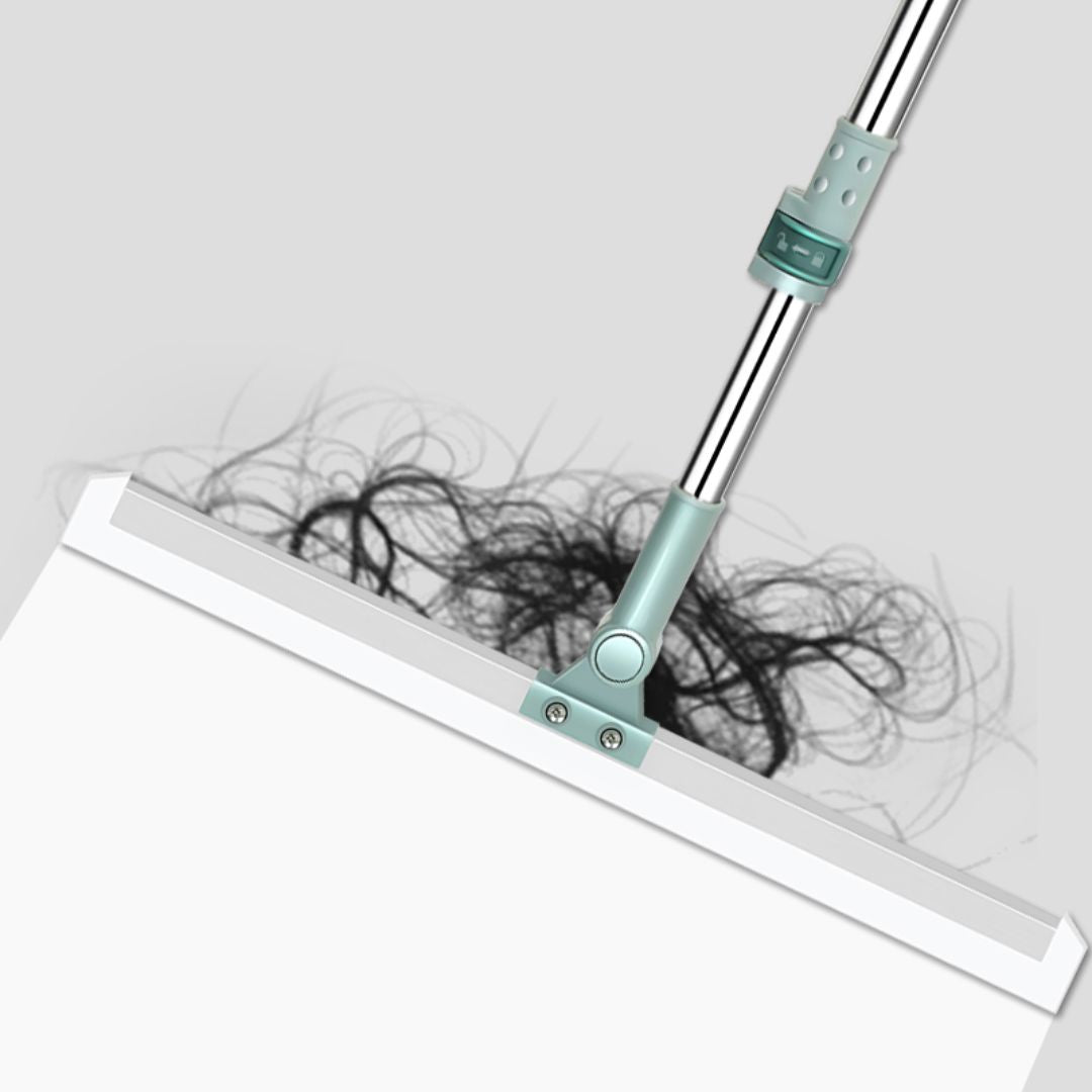 Bodenwischer mit Teleskopstange, grün, entfernt Haare, ideal für glatte Oberflächenreinigung.