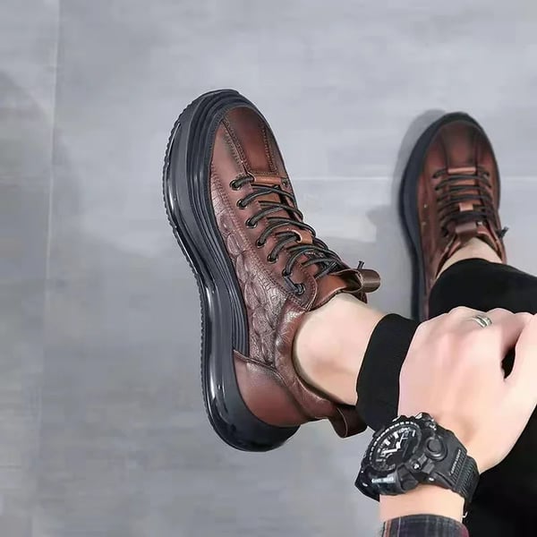 Braune Air-Cushion-Sneaker aus Leder, Herrenmode, bequeme Freizeitschuhe, rutschfeste Sohle.