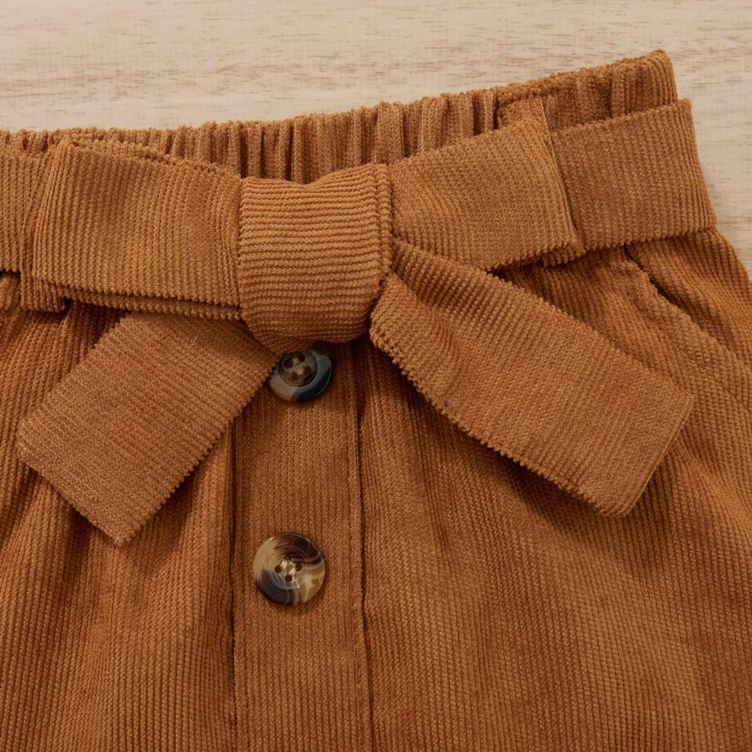 Brauner Cordrock mit Schleife und Knöpfen, Damenmode, Herbstkleidung, Vintage-Stil.