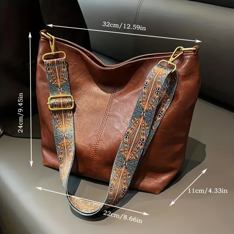 Braune Ledertasche mit gemustertem Schultergurt, modisch, geräumig, Damenhandtasche.