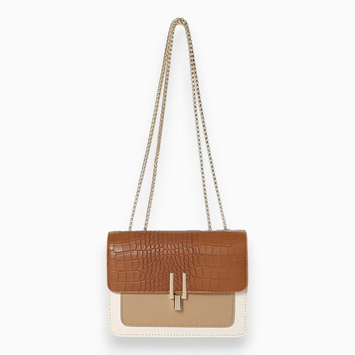 Braune Krokodilleder-Handtasche mit Kettenriemen, elegante Damenmode, stilvolles Accessoire.