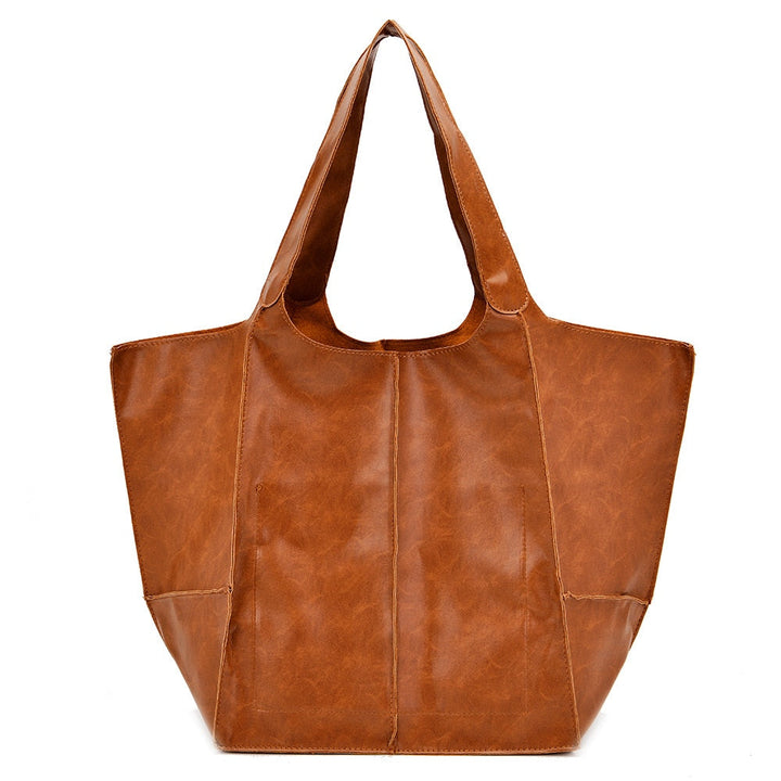 Braune Lederhandtasche, geräumig, modisch, für Damen, Shopper-Stil, elegantes Design.