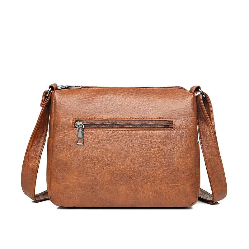Braune Leder-Umhängetasche mit Reißverschluss, modisch, Damen, elegant, vielseitig.