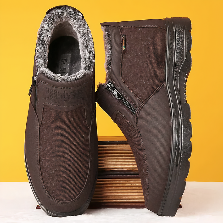 Braune Herren-Winterstiefel mit Kunstfellfutter, rutschfeste Sohle, Reißverschluss, warm.