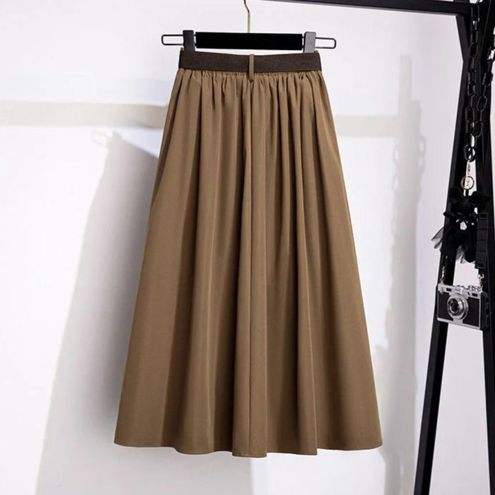Brauner Faltenrock Damen, knielang, elegant, aus Baumwolle, modisch, vielseitig einsetzbar.