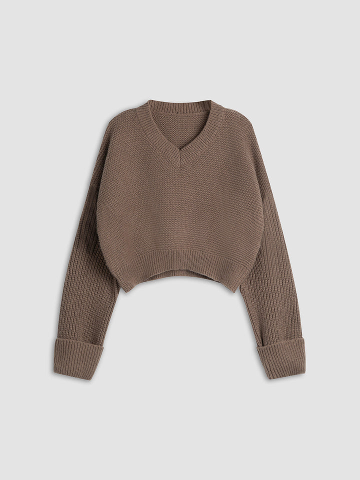 Brauner Strickpullover Damen, V-Ausschnitt, lange Ärmel, modisch, Herbstmode, gemütlich.