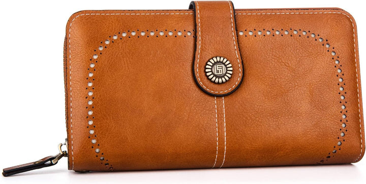 Braune Damen-Lederbrieftasche mit Druckknopfverschluss und dekorativen Nähten.