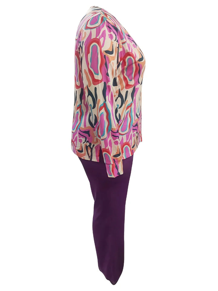 Bunte Damenbluse mit abstraktem Muster, langärmelig, aus Baumwolle, seitliche Ansicht.