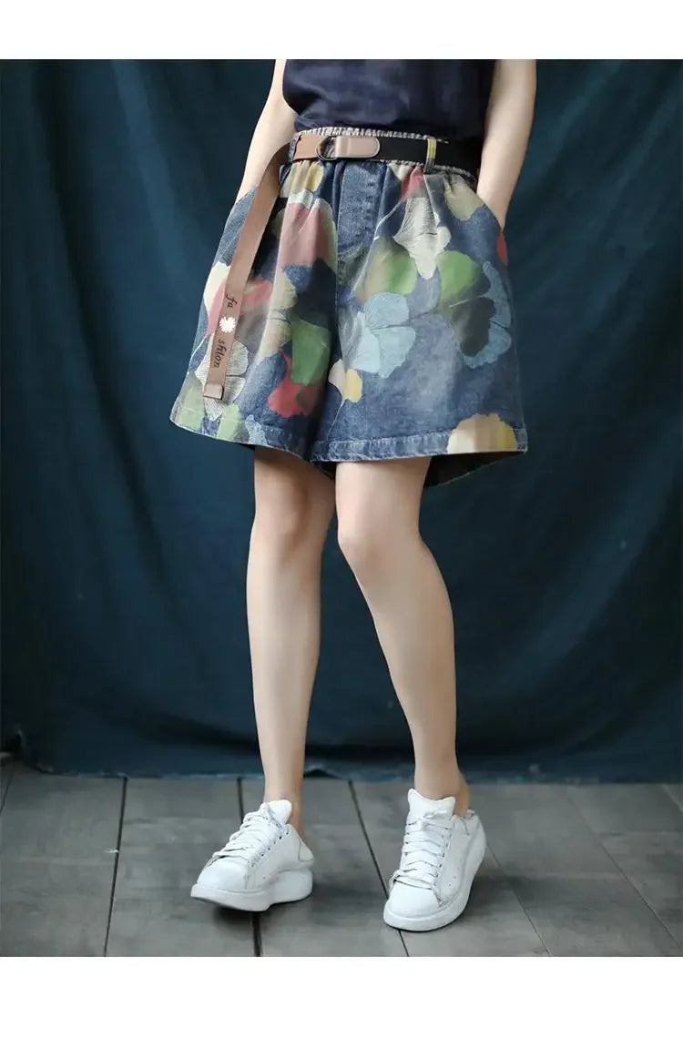 Damen Jeansrock mit buntem Blumenmuster, knielang, lässig, modisch, ideal für Sommer.