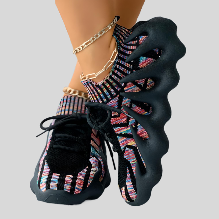 Bunte Damen-Sneaker mit welliger Sohle, modisches Design, ideal für Freizeitkleidung.