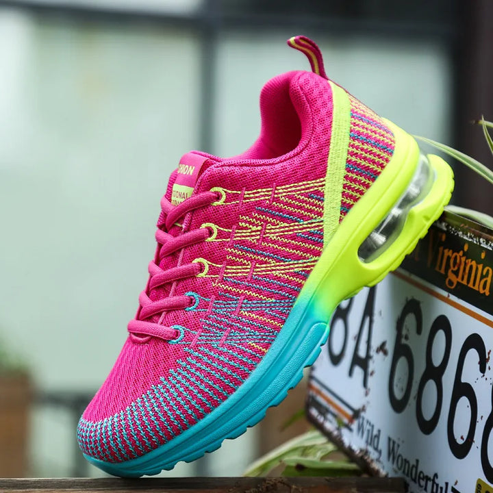 Bunter Sportschuh, pink-gelb-blau, atmungsaktiv, für Damen, mit Luftpolstersohle.