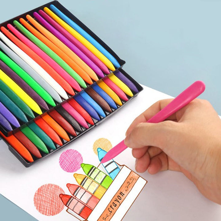 Bunte Wachsmalstifte-Set, 24 Farben, Zeichnung auf Papier, Hand hält rosa Stift.