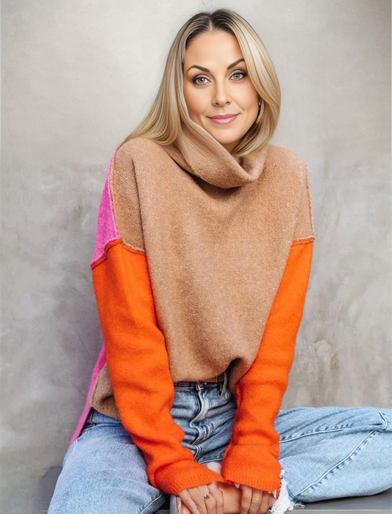 Frau in orange-braunem Pullover mit Rollkragen, lässig sitzend, modische Herbstkleidung.
