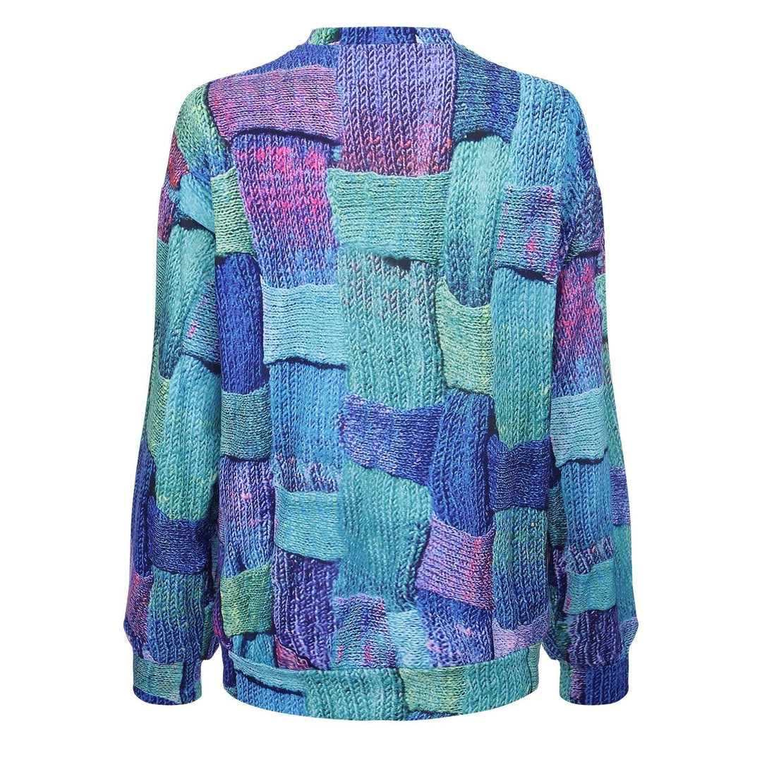 Bunter Strickpullover, Patchwork-Design, Blau- und Grüntöne, Damenmode, Herbst/Winter.