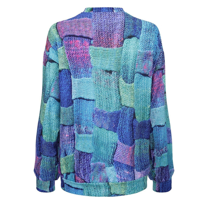 Bunter Strickpullover, Patchwork-Design, Blau- und Grüntöne, Damenmode, Herbst/Winter.