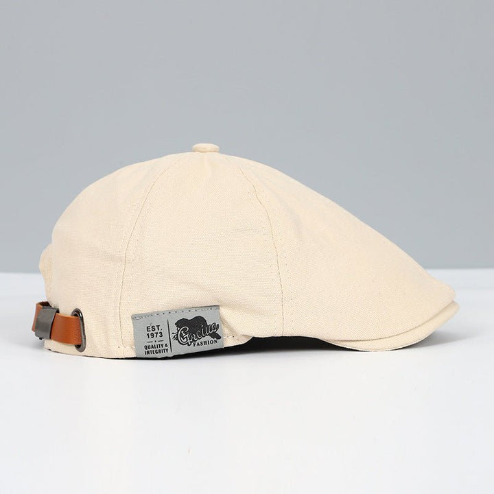 Beige Schiebermütze aus Baumwolle mit Lederriemen, Vintage-Design, Herrenmode Accessoire.
