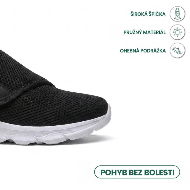 Detail špičky černé síťované boty s bílou podešví, doplněný ikonami o široké špičce, pružném materiálu a ohebné podešvi. 23