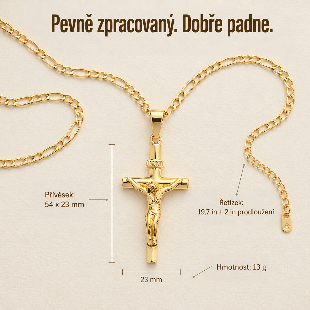 Zlatý krucifix s řetízkem Figaro a prodlužovacím článkem rozložený na krémovém podkladu s vyznačenými rozměry 6