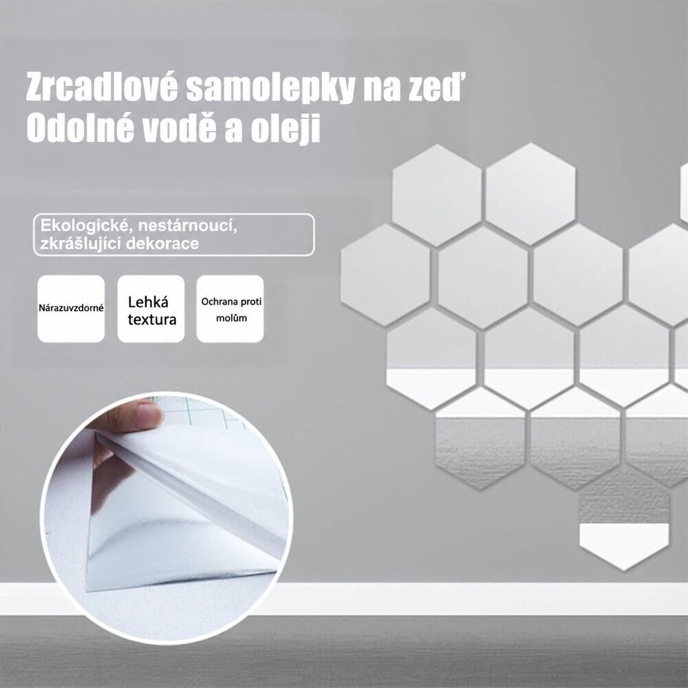 Šestiúhelníkové zrcadlové samolepky na šedé zdi s kruhovým detailem odlepování krycí vrstvy z lepicí strany. 4