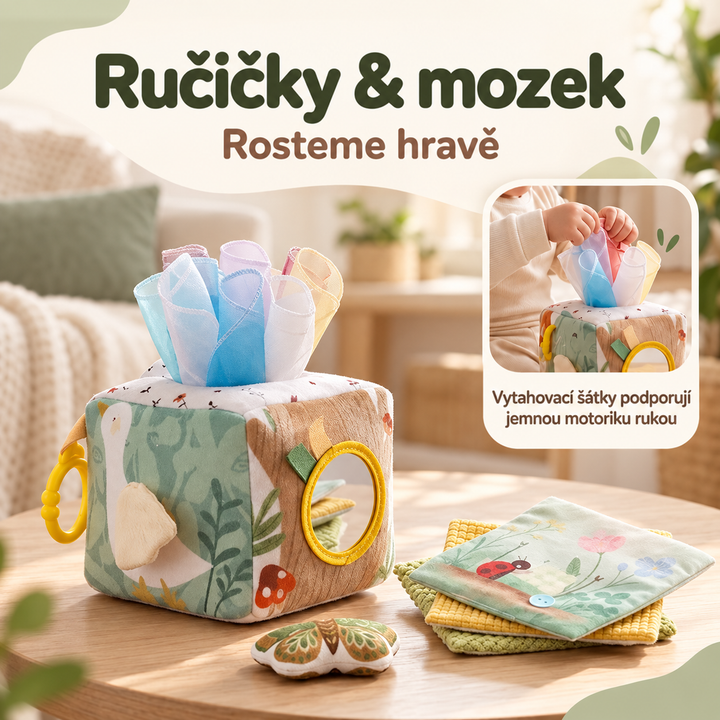 Kostka s vytaženými šátky na stolku v obýváku, vedle ní látkové knížky a motýlek 2