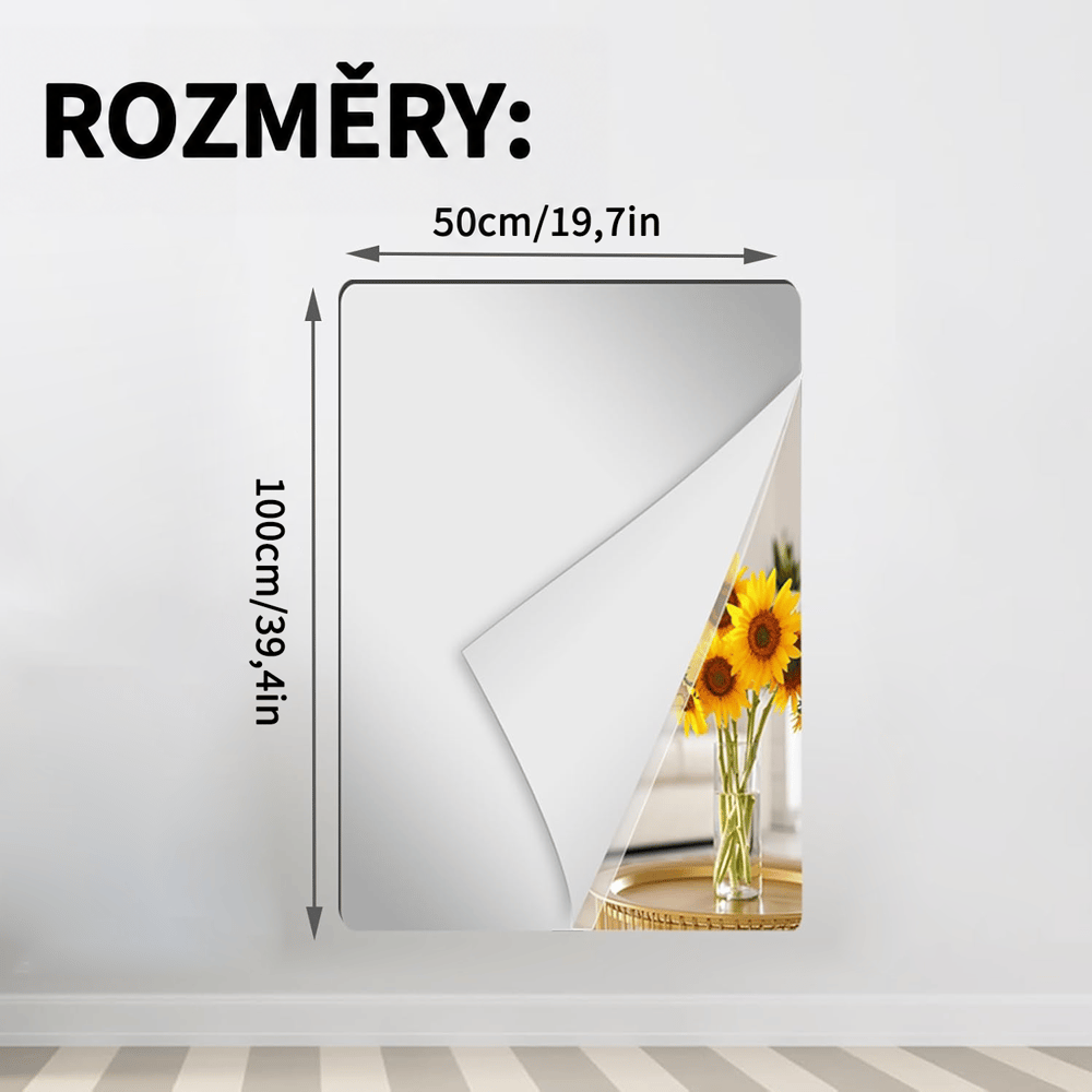 Obdélníková zrcadlová fólie na stěně s odlepeným rohem a odrazem slunečnic ve váze, s vyznačenými rozměry. 12