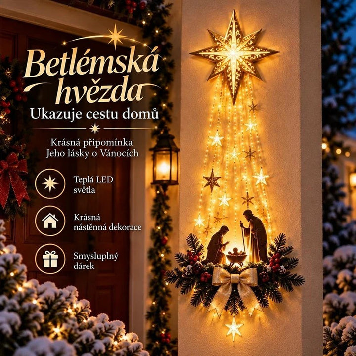 Zářící dekorace s hvězdou, jesličkami a mašlí na zdi u vchodu, večerní vánoční výzdoba 1