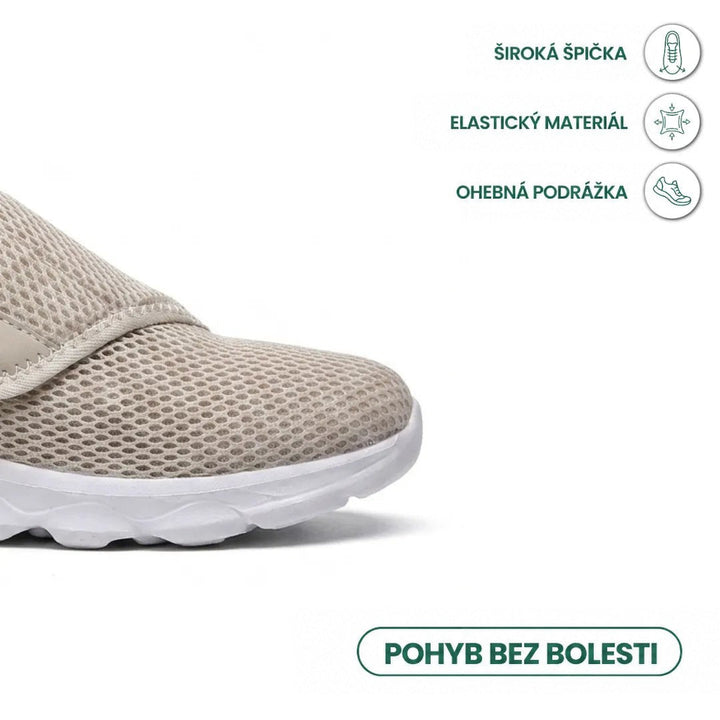 Detail špičky béžové síťované boty s bílou podešví, doplněný ikonami o široké špičce, pružném materiálu a ohebné podešvi. 32