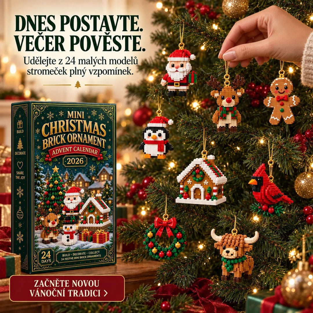 Ruka věší figurku na osvětlený vánoční strom, na větvích visí Santa, sob, perníček, tučňák, chaloupka, kardinál, věnec a kráva. 7