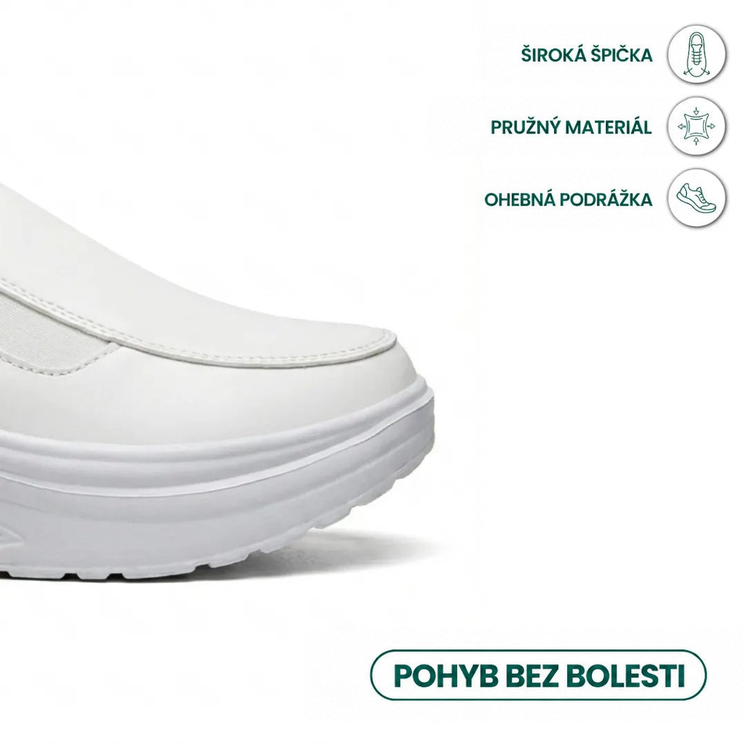 Detail široké špičky bílé boty, grafika upozorňuje na elastický materiál a pružnou podrážku 14