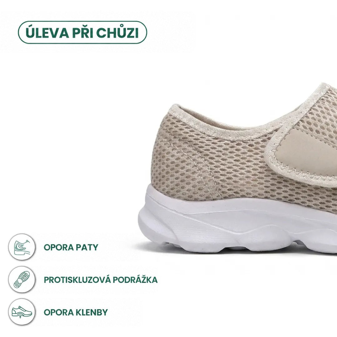 Detail paty béžové síťované boty s bílou podešví a popruhem na suchý zip, doplněný ikonami o opoře paty a klenby. 31